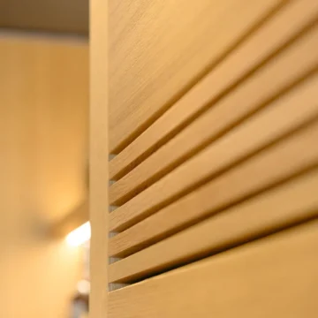 Detail of Wall-mounted storage furniture for a beverage cellar