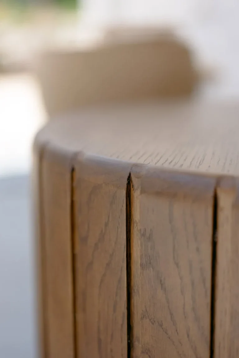 Detail of a wooden round table
