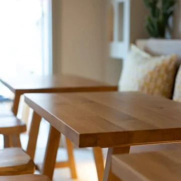 Wooden tables and chairs in a dining room