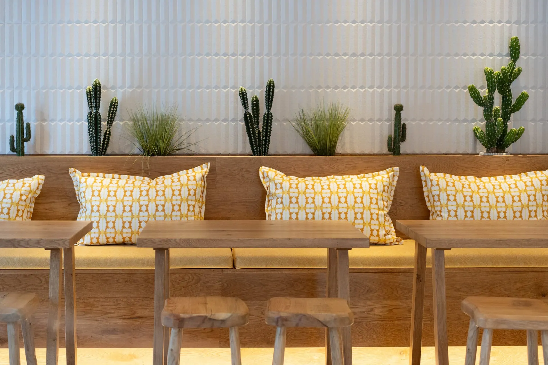 Dining room detail. depicting a table, two chairs and part of a sofa